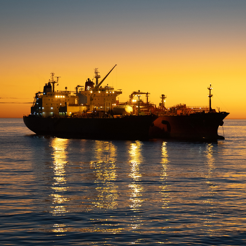 Navigator Global And The Green Pioneer At Dusk At The Outer Anchorage Of Port Dampier