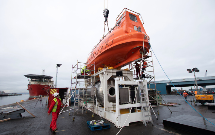 James Fisher Defense Employees checking equipment.